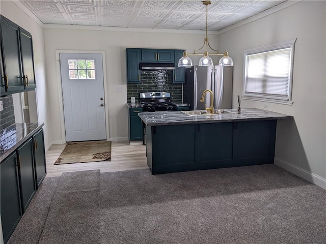 203 W 4th St, Holden, MO 64040 - kitchen featuring stainless steel appliances, under cabinet range hood, an ornate ceiling, a peninsula, and ornamental molding