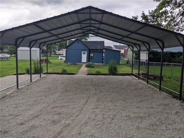 203 W 4th St, Holden, MO 64040 - view of parking / parking lot with a detached carport