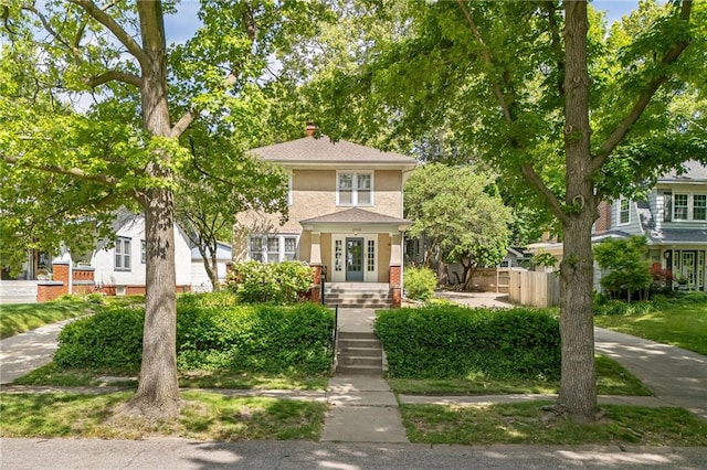 2719 Fairleigh Ter, Saint Joseph, MO 64506 - american foursquare style home featuring a chimney and stucco siding