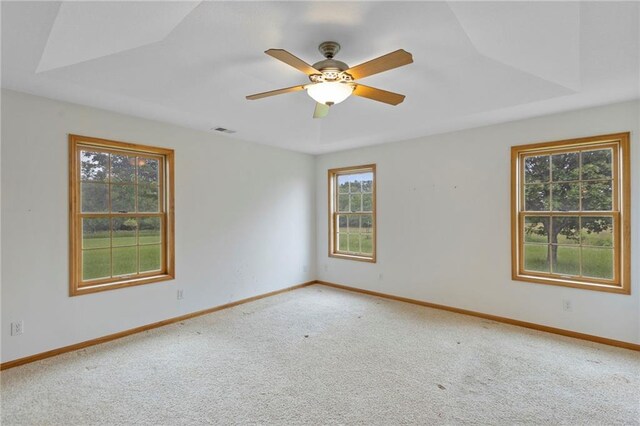 25549 Chieftain Rd, Lawrence, KS 66044 - unfurnished room featuring carpet flooring, baseboards, and a ceiling fan