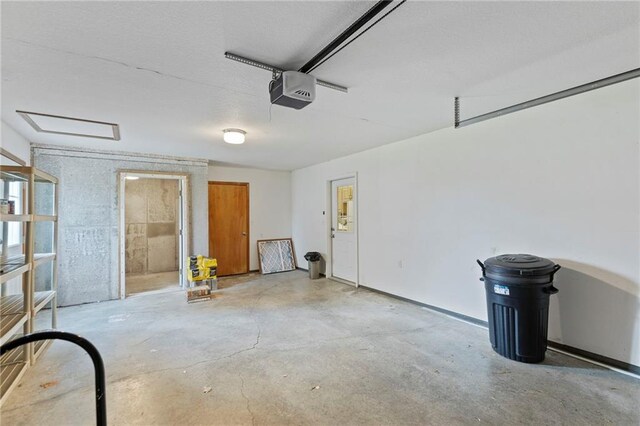 25549 Chieftain Rd, Lawrence, KS 66044 - garage featuring a garage door opener
