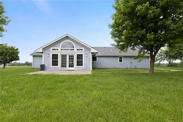25549 Chieftain Rd, Lawrence, KS 66044 - back of house with a lawn, a patio area, and french doors