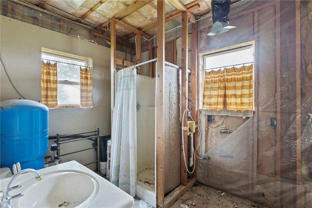 25549 Chieftain Rd, Lawrence, KS 66044 - full bath featuring a shower stall and a sink