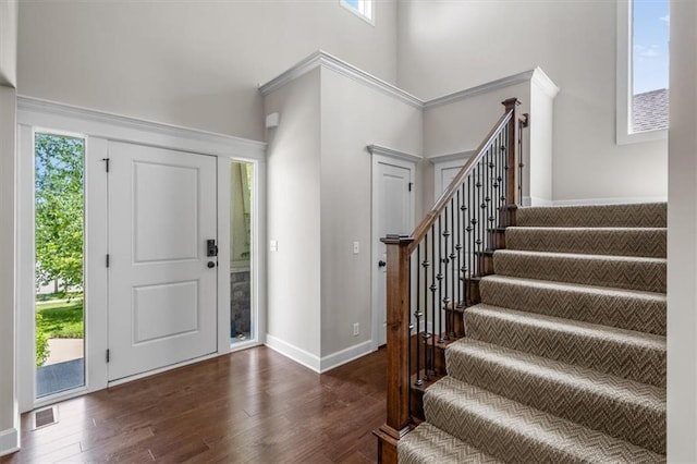 9154 Shady Bend Rd, Lenexa, KS 66227 - entryway featuring a high ceiling, wood finished floors, and stairway
