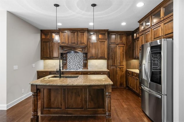 9154 Shady Bend Rd, Lenexa, KS 66227 - kitchen featuring stainless steel fridge with ice dispenser, dark wood finished floors, backsplash, light stone counters, and recessed lighting