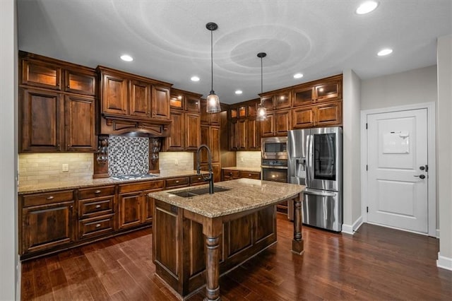 9154 Shady Bend Rd, Lenexa, KS 66227 - kitchen featuring appliances with stainless steel finishes, dark wood-style floors, glass insert cabinets, tasteful backsplash, and a center island with sink