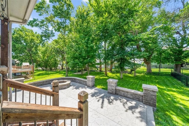 9154 Shady Bend Rd, Lenexa, KS 66227 - view of patio / terrace with an outdoor fire pit