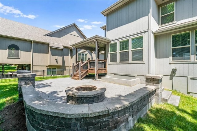 9154 Shady Bend Rd, Lenexa, KS 66227 - view of patio / terrace with an outdoor fire pit