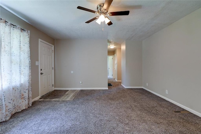 3512 Harvard Ave, Independence, MO 64052 - carpeted spare room with ceiling fan and a textured ceiling