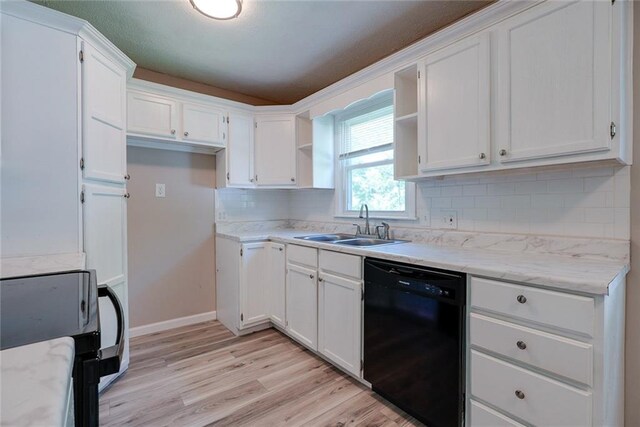 3512 Harvard Ave, Independence, MO 64052 - kitchen with black dishwasher, open shelves, and white cabinets