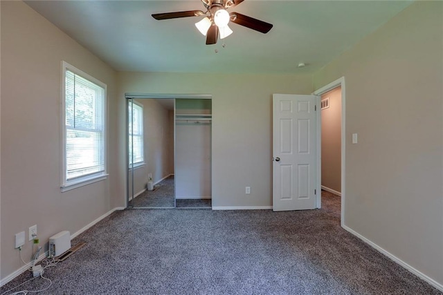 3512 Harvard Ave, Independence, MO 64052 - unfurnished bedroom with carpet flooring, a closet, and a ceiling fan