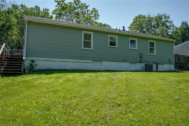 3512 Harvard Ave, Independence, MO 64052 - back of property featuring a wooden deck and stairs