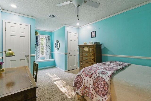 11409 Riley St, Overland Park, KS 66210 - carpeted bedroom with crown molding, a textured ceiling, and a ceiling fan