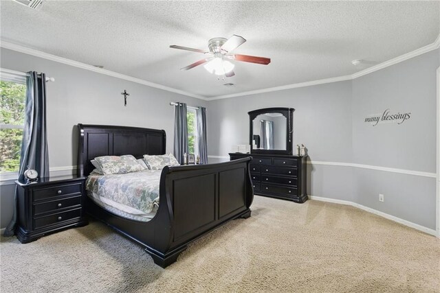 11409 Riley St, Overland Park, KS 66210 - bedroom with multiple windows, light carpet, a textured ceiling, crown molding, and ceiling fan