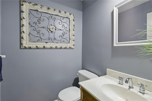 11409 Riley St, Overland Park, KS 66210 - bathroom featuring toilet and vanity