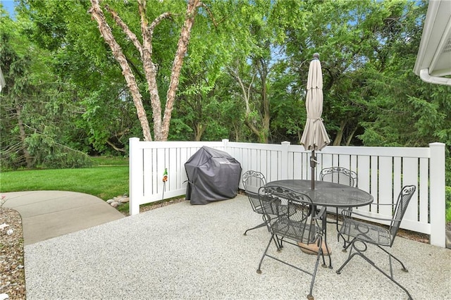 7226 Meadow View St, Shawnee, KS 66227 - view of patio featuring outdoor dining area and grilling area