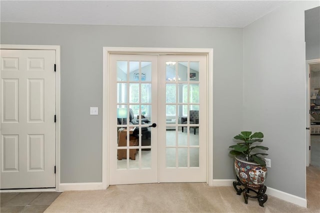7226 Meadow View St, Shawnee, KS 66227 - entryway with french doors, baseboards, and carpet flooring