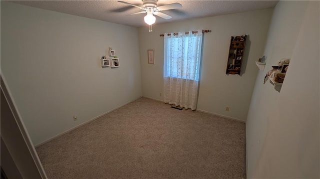 2006 Colonial Dr, Pittsburg, KS 66762 - spare room featuring ceiling fan, carpet floors, and a textured ceiling