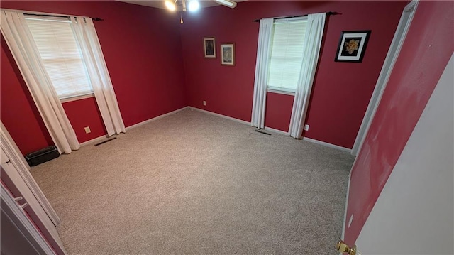 2006 Colonial Dr, Pittsburg, KS 66762 - spare room featuring carpet, ceiling fan, and baseboards