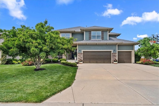 17746 W 165th Pl, Olathe, KS 66062 - view of front of home with concrete driveway, a front yard, and a garage