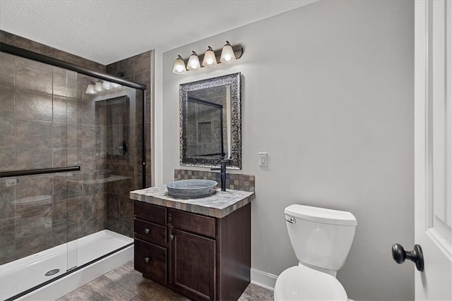 17746 W 165th Pl, Olathe, KS 66062 - bathroom with vanity, a shower stall, and a textured ceiling