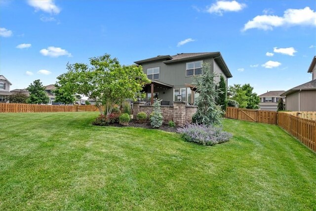 17746 W 165th Pl, Olathe, KS 66062 - back of house featuring a fenced backyard