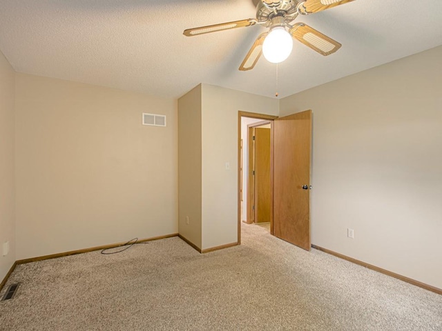 17928 E Whitney Rd, Independence, MO 64057 - carpeted spare room featuring ceiling fan and baseboards