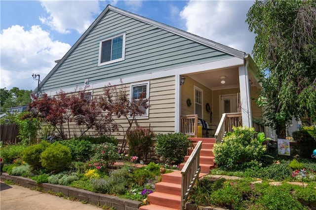 4930 Holly St, Kansas City, MO 64112 - bungalow with covered porch and stairs
