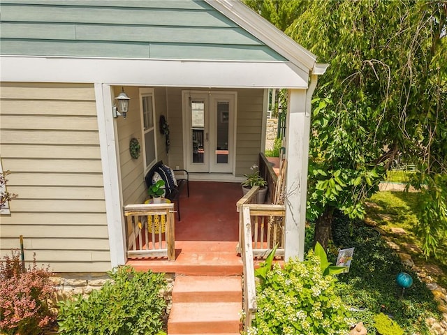 4930 Holly St, Kansas City, MO 64112 - view of exterior entry with a porch