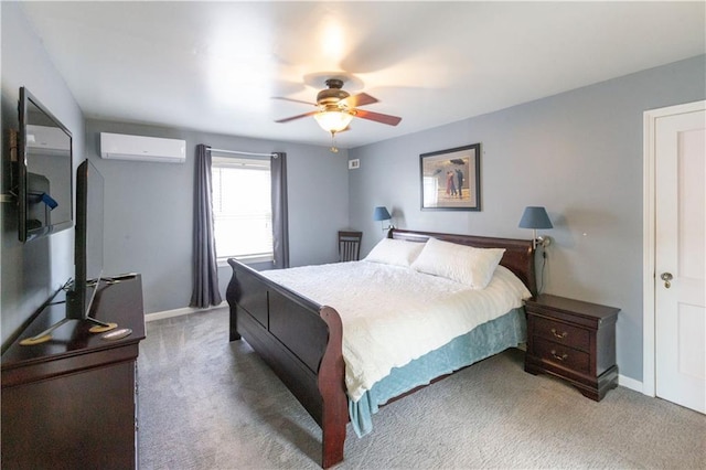 4930 Holly St, Kansas City, MO 64112 - carpeted bedroom featuring an AC wall unit and ceiling fan