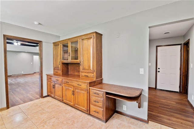 2207 N 154th Ter, Basehor, KS 66007 - interior space featuring baseboards and light wood-style flooring