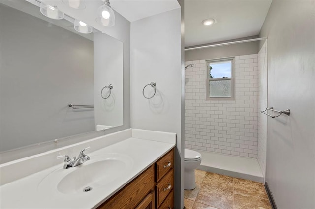 2207 N 154th Ter, Basehor, KS 66007 - bathroom featuring vanity and tiled shower