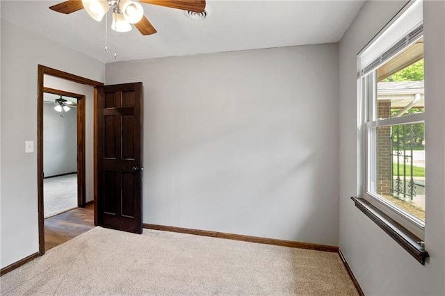2207 N 154th Ter, Basehor, KS 66007 - carpeted empty room featuring a ceiling fan and baseboards