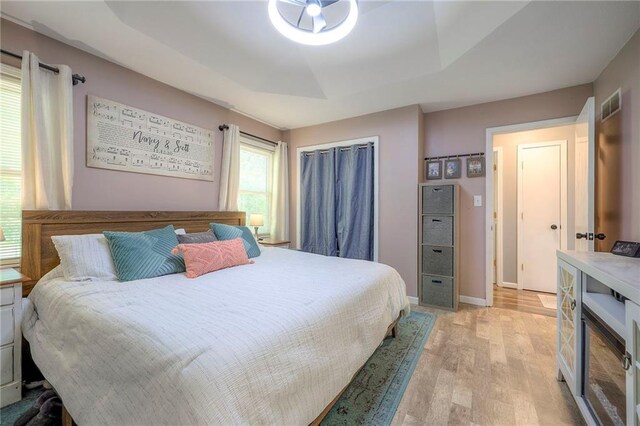 5603 Cody St, Shawnee, KS 66203 - bedroom with light wood-style floors and baseboards