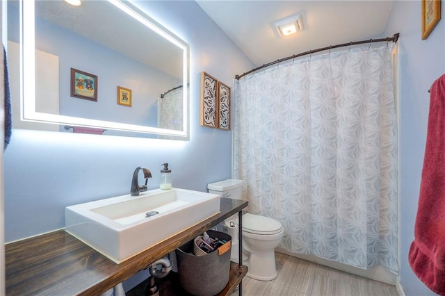 5603 Cody St, Shawnee, KS 66203 - bathroom featuring curtained shower