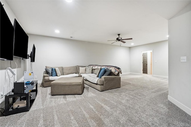 1402 NW Red Oak Ct, Grain Valley, MO 64029 - carpeted living area featuring a ceiling fan and recessed lighting