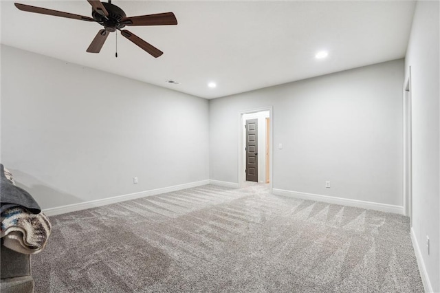 1402 NW Red Oak Ct, Grain Valley, MO 64029 - carpeted empty room featuring recessed lighting and a ceiling fan