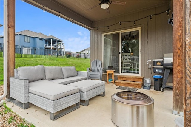 1402 NW Red Oak Ct, Grain Valley, MO 64029 - fenced backyard featuring a ceiling fan, a patio, an outdoor hangout area, and entry steps