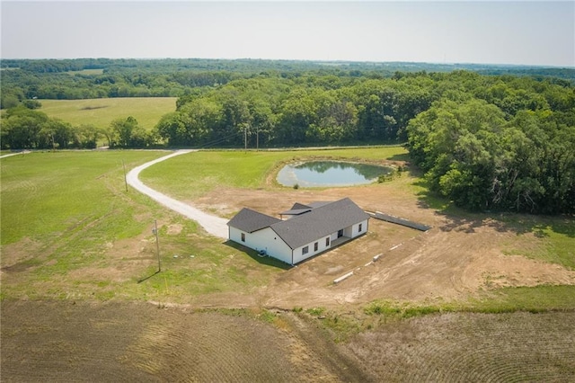 350 NW 1201st Rd, Holden, MO 64040 - aerial view of sparsely populated area with a heavily wooded area
