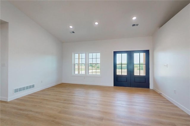 350 NW 1201st Rd, Holden, MO 64040 - entrance foyer featuring french doors, light wood finished floors, and recessed lighting