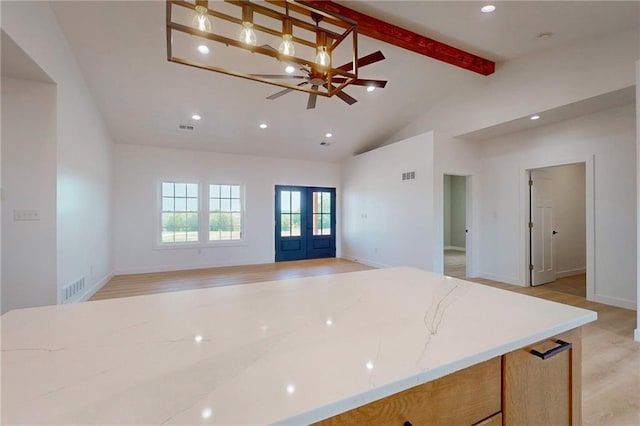 350 NW 1201st Rd, Holden, MO 64040 - kitchen featuring beam ceiling, open floor plan, recessed lighting, high vaulted ceiling, and french doors