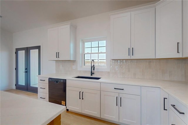 350 NW 1201st Rd, Holden, MO 64040 - kitchen with dishwasher, french doors, tasteful backsplash, white cabinetry, and light stone countertops
