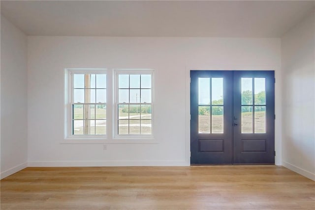 350 NW 1201st Rd, Holden, MO 64040 - foyer with french doors and light wood-style flooring