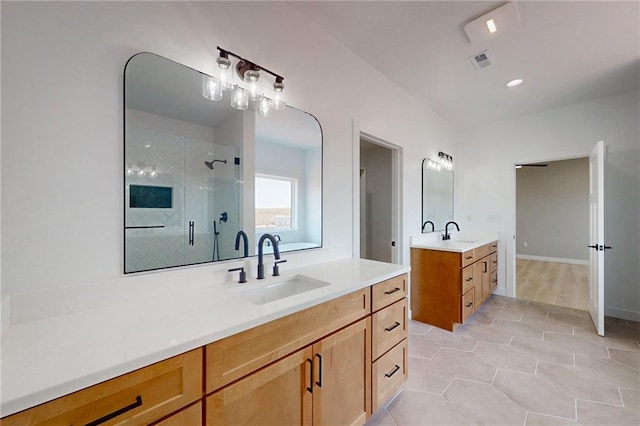 350 NW 1201st Rd, Holden, MO 64040 - bathroom with a shower stall, two vanities, and tile patterned floors