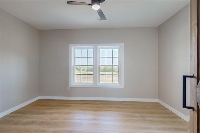 350 NW 1201st Rd, Holden, MO 64040 - empty room with a ceiling fan and light wood-style flooring