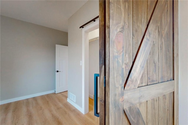 350 NW 1201st Rd, Holden, MO 64040 - corridor featuring wood finished floors and baseboards