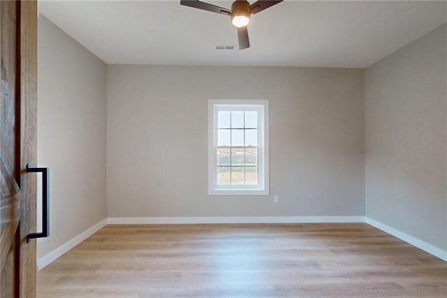 350 NW 1201st Rd, Holden, MO 64040 - spare room featuring light wood-style flooring and a ceiling fan