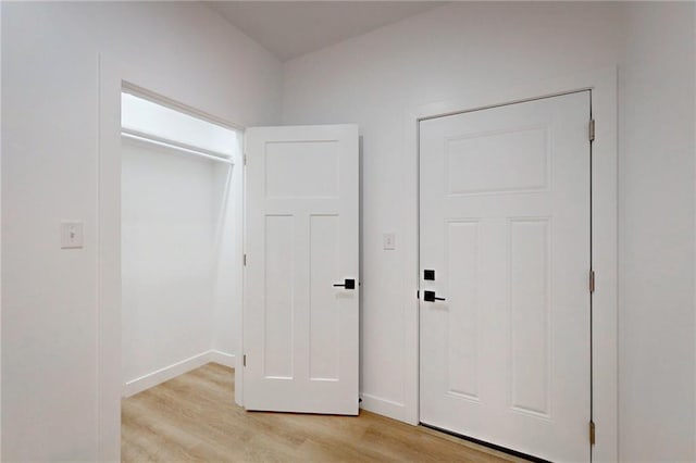 350 NW 1201st Rd, Holden, MO 64040 - unfurnished bedroom with light wood-type flooring and baseboards