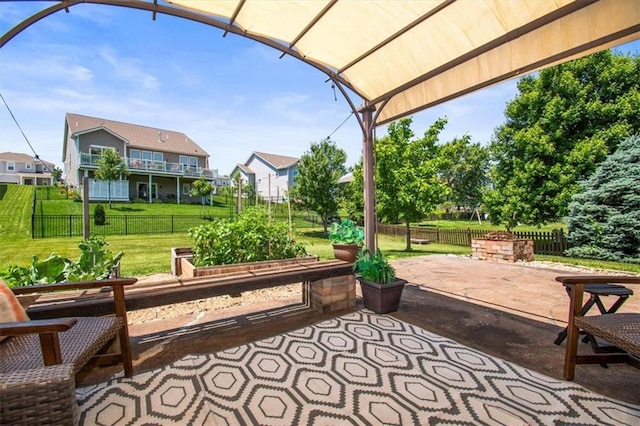 600 SW Gentry Ln, Lees Summit, MO 64081 - view of patio / terrace with a vegetable garden