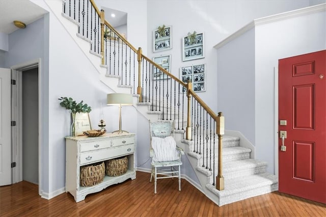 600 SW Gentry Ln, Lees Summit, MO 64081 - entrance foyer with wood finished floors and stairs